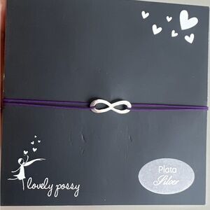 Small infinity logo sterling silver bracelet with purple adjustable thread